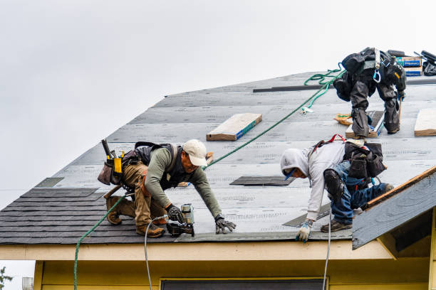 Professional Roofing technician working in Moosic, PA